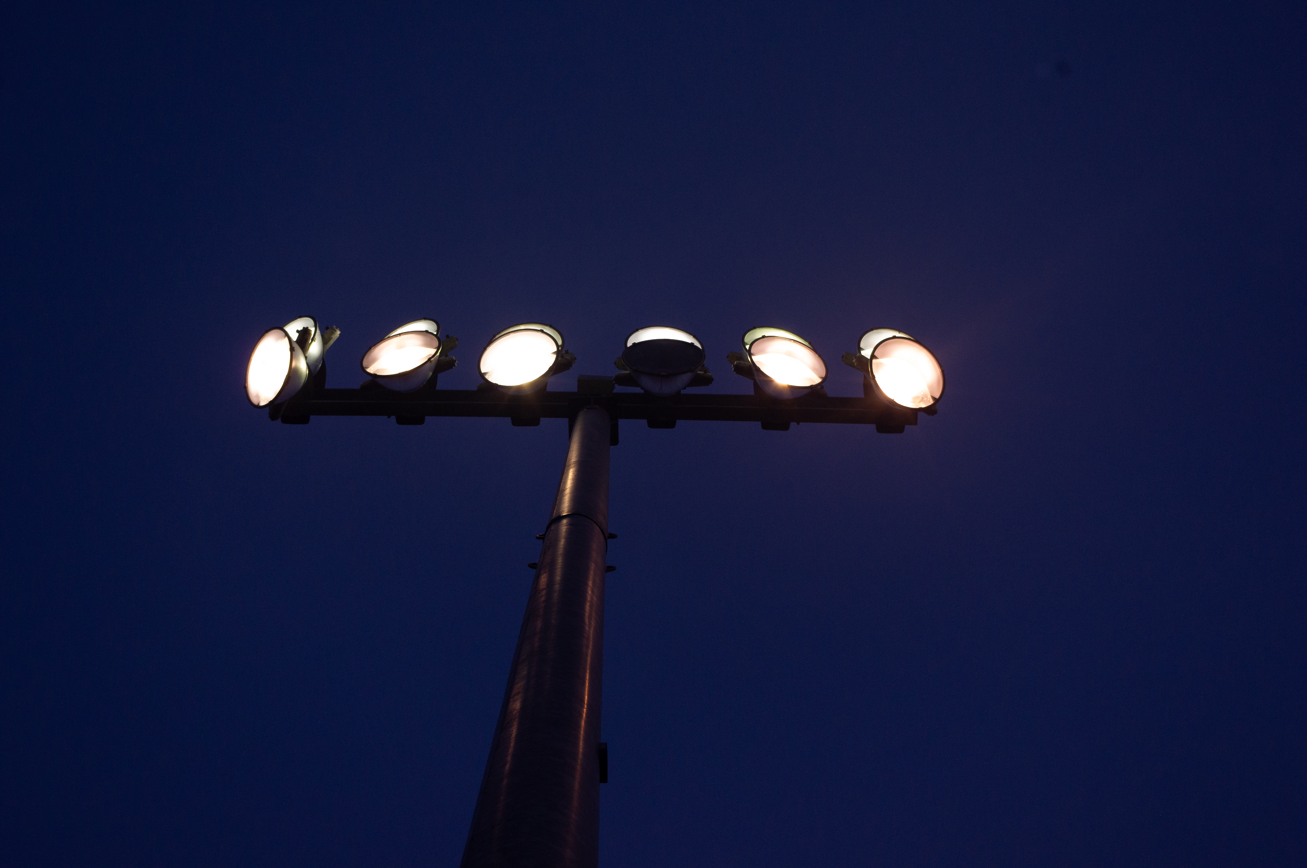 Stadium lights against dark sky